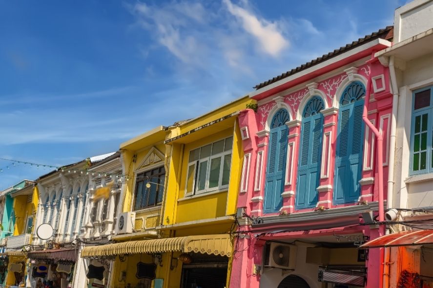 colorful streets of phuket old town under a bright blue sky